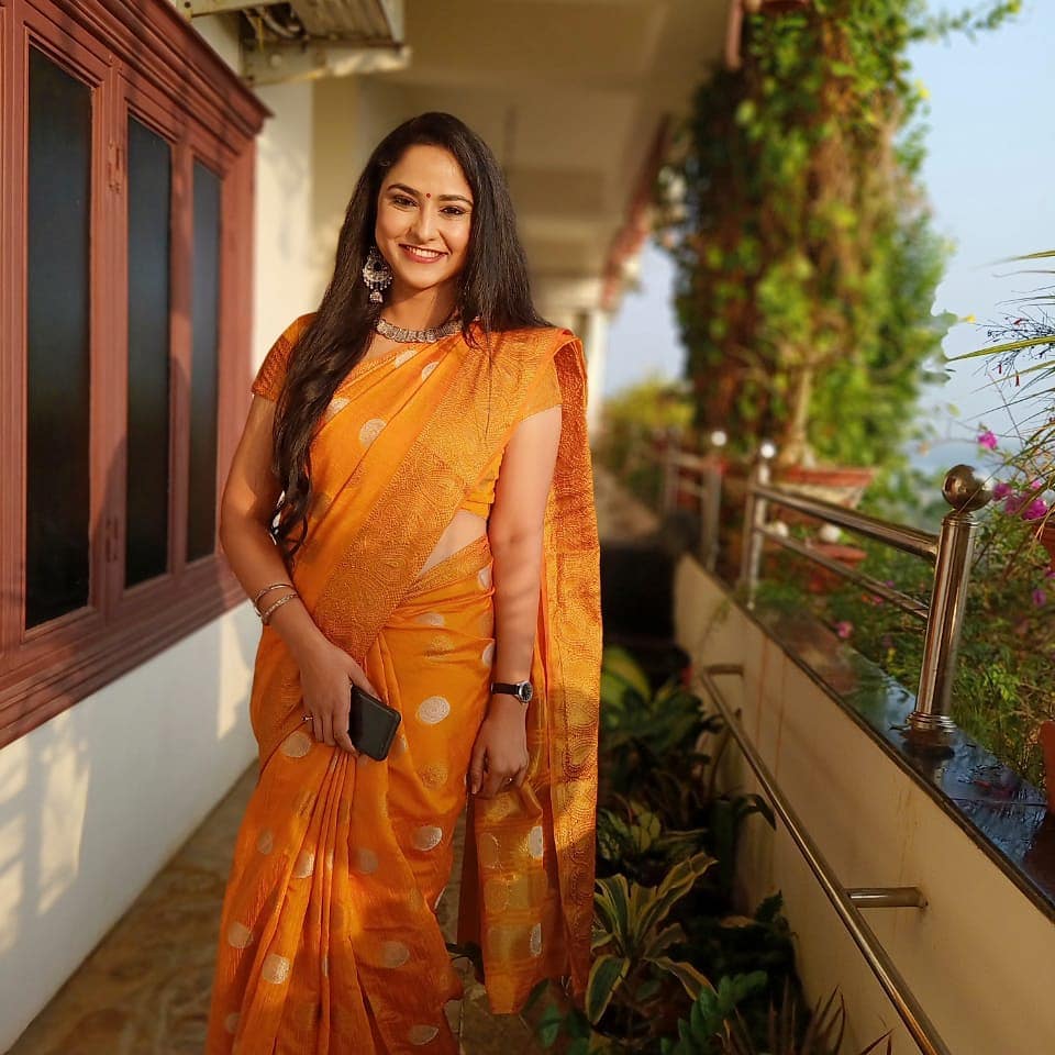 Telugu Tv Anchor Kasi Annapurna Stills in Orange Saree